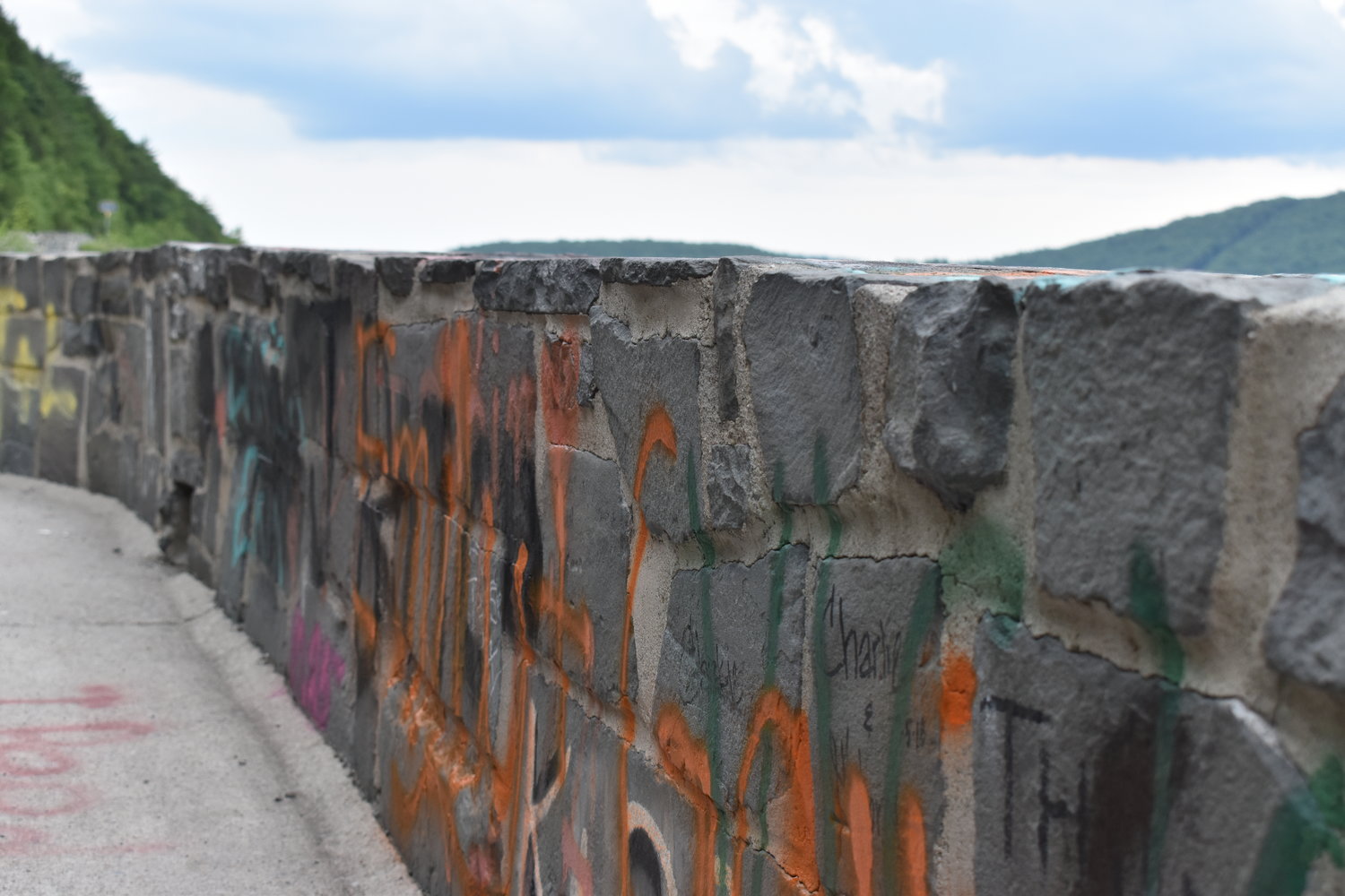 The Hawks Nest, a once beautiful scenic overlook, has been overtaken by graffiti.